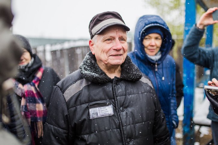 Nikolay Voishchev surrounded by his friends