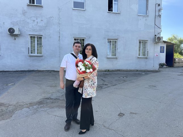 Sona and her husband outside the correctional center